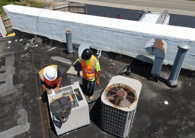 Roofing contractors planning a roof repair