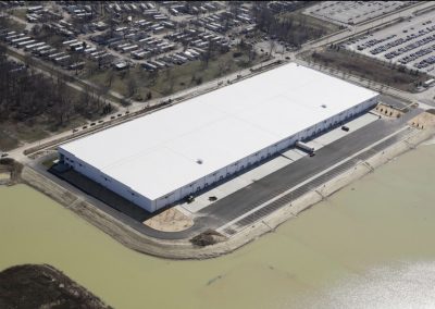 White Flat Commercial Roof Installation at a Warehouse.