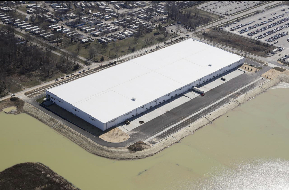 Holland Roofing crew working on commercial flat roof