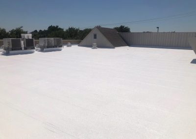 Commercial roof with white roof coating